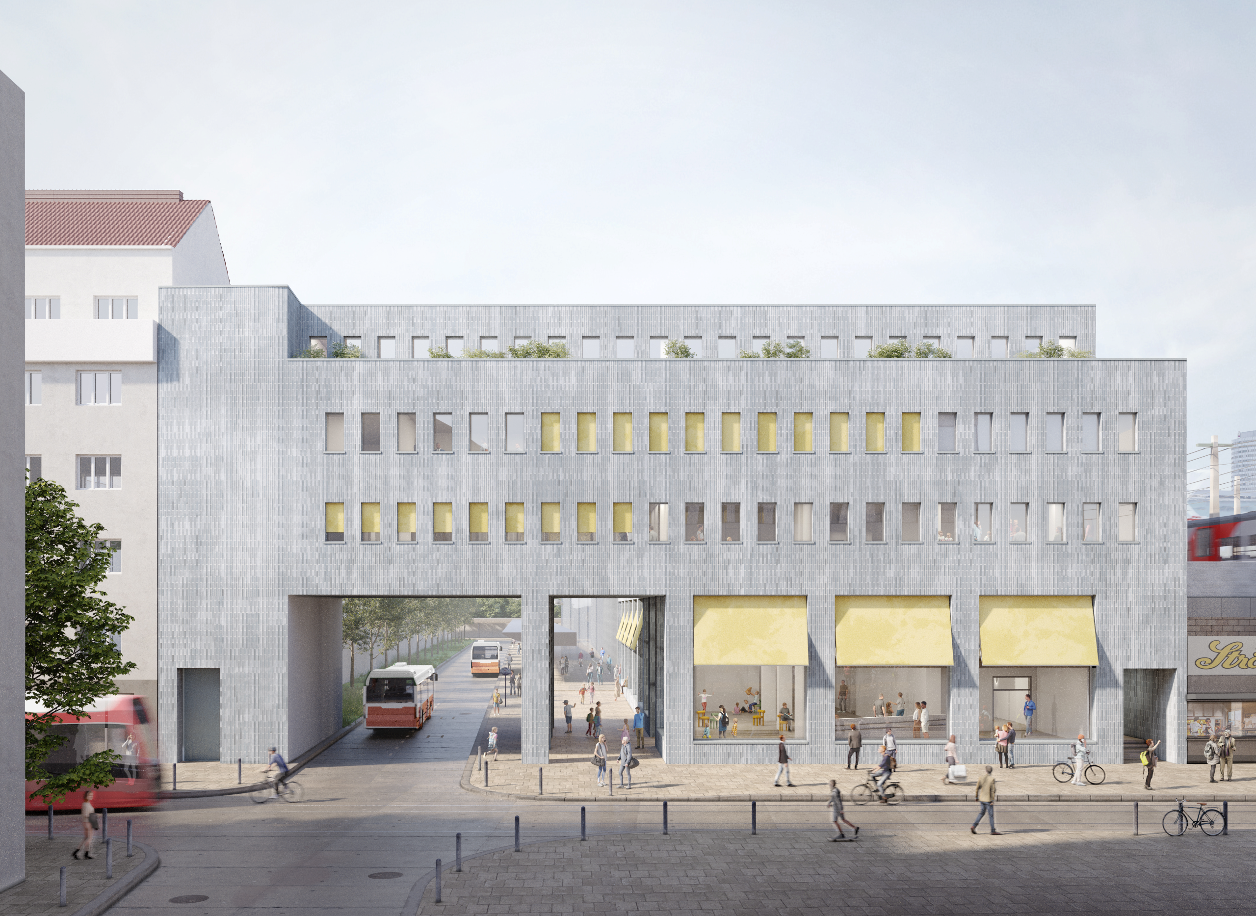 Ansicht des alten Gebäudes mit Glasfront und Durchgang.